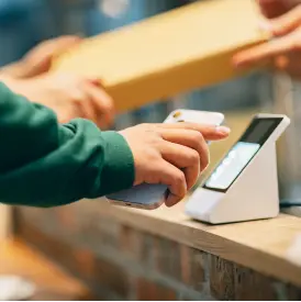 Close up of paying with phone